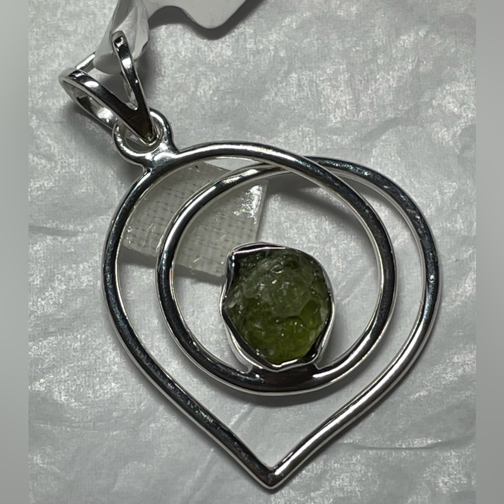 Raw peridot Pendant